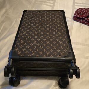 Louis Vuitton Brown and Black Travel Bag with Iconic Design